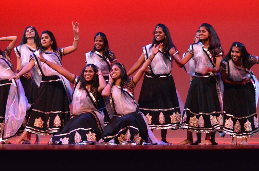 A dance group poses for the end of their dance during India Nite 2014. India Nite highlighs Indian culture with music, dance, dress, and food. (Photo Credit: Megan FIscher)