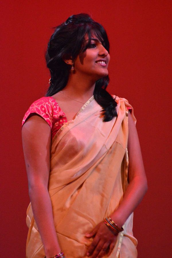 Occupational therapy masters student, Tanya Benjamin, sings as part of a group for India Nite. India Nite highlights Indian culture with music, dress, and food. (Photo Credit: Megan Fischer)