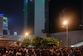 Hong Kong protests beneath Chinese central government offices. (Photo Credit: Wikimedia)