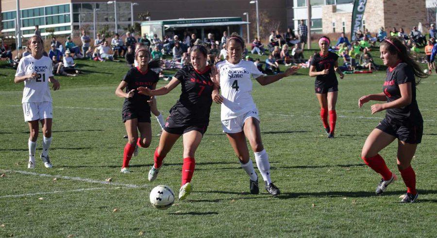Colorado State midfielder Bri Sweeney (4) battles for the ball during Sunday's match with San Diego State. (Photo Courtesy: CSU Athletics)
