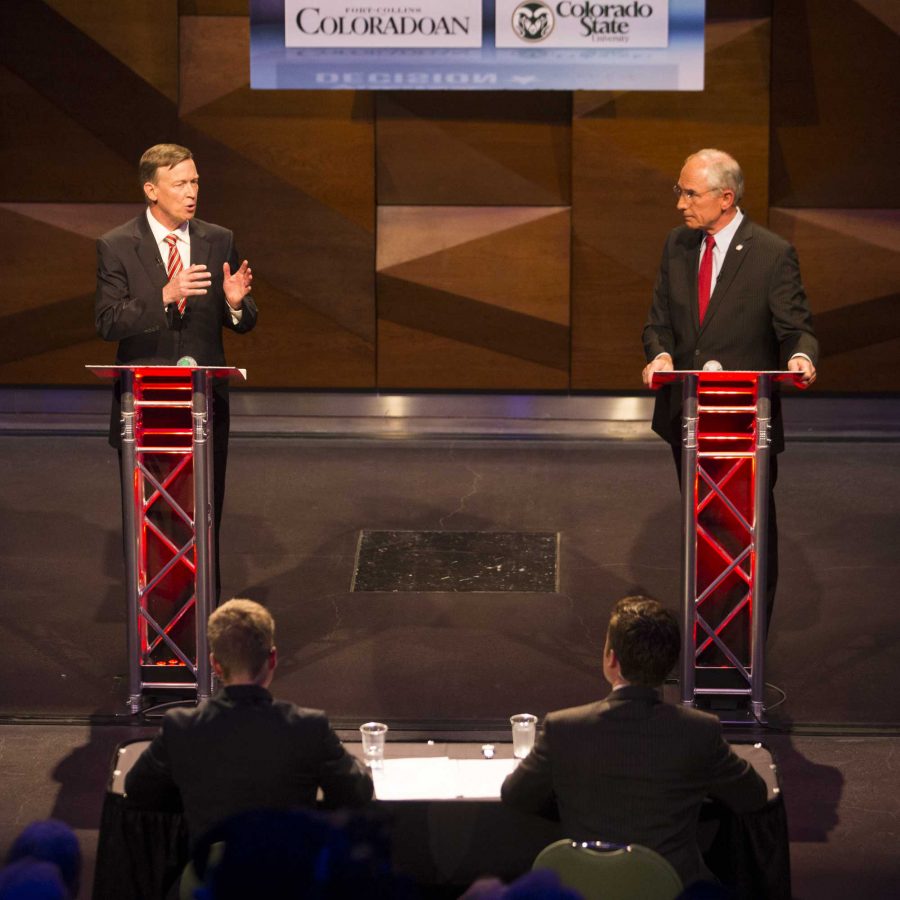 Incumbent, John Hickenlooper (left), responds to a question by challenger, Bob Beauprez (right), in the gubernatorial debate held in the LSC ballroom Thursday night.
