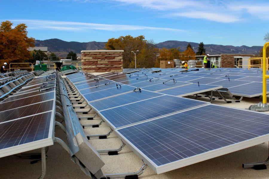 It takes about one week to install a set of solar panels, according to Nick Williamson, Commercial Project Manager for Namaste Solar. Colorado State University plans to install five more sets by June. (Photo by: Christina Vessa).