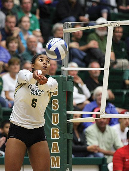 Jasmine Hanna (6), goes to bump the ball at Thursday nights volleyball game against UNLV. (Photo credit: Abbie Parr)