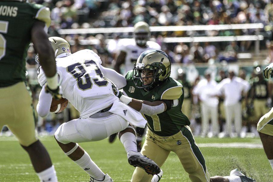 True Freshmen Shun Johnson tackles a UC Davis player at Hughes Stadium on Saturday, September 13th. Shun made a name for himself on Saturday, as he had one solo tackles and six assists during the game.