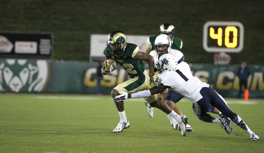 Colorado State wide receiver Rashard Higgins escapes a Utah State defender during last seasons game. (Collegian File Photo)