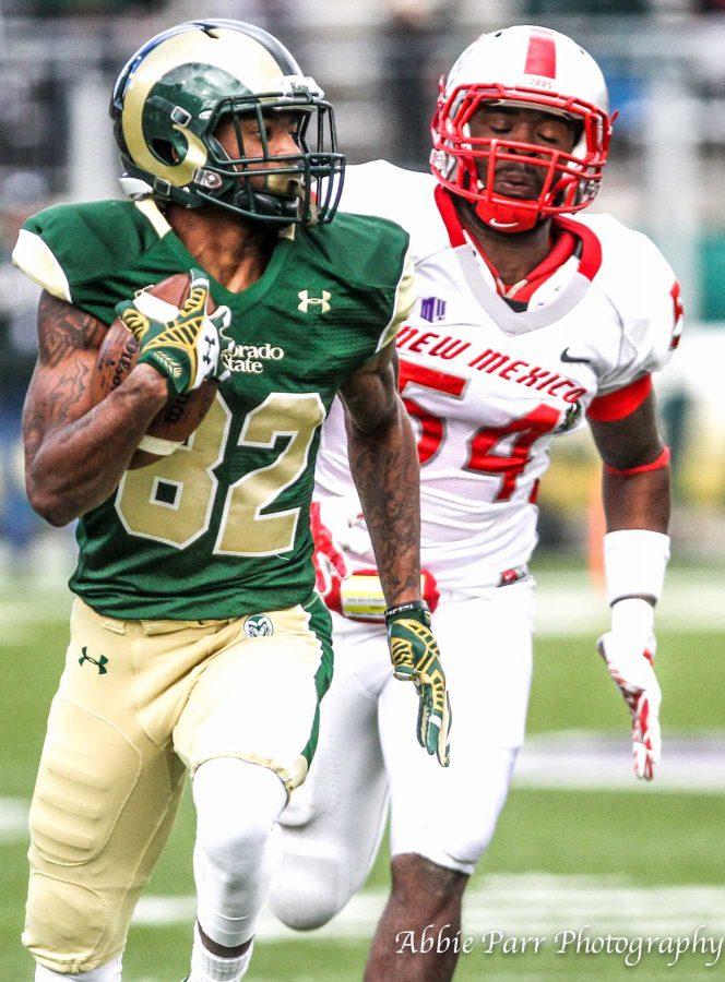 Colorado State wide receiver Rashard Higgins (82), eludes a defender during Saturday's game against New Mexico. 
