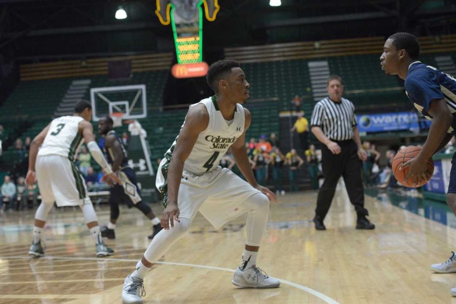 Colorado State guard John Gillon defends a Charleston Southern player Monday's game.  (Photo Courtesy: CSU Athletics)