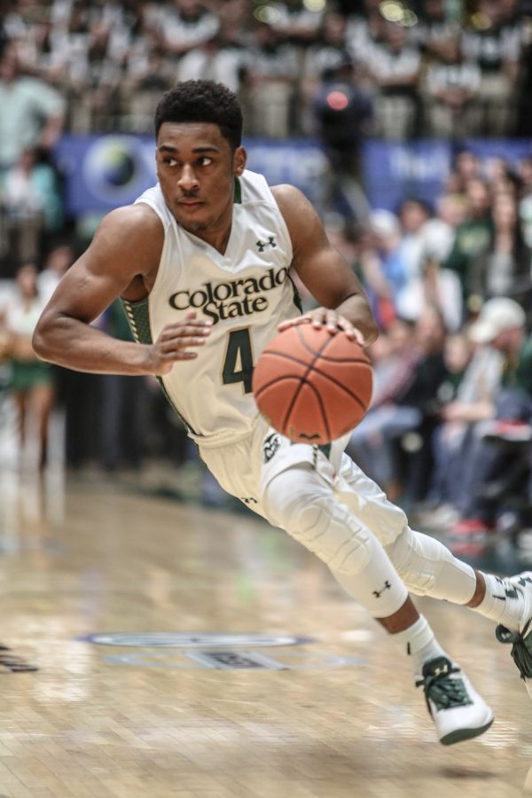 CSU guard John Gillon drives to the basket against Fresno State at Moby Arena in 2014. (Photo by Austin Simpson)
