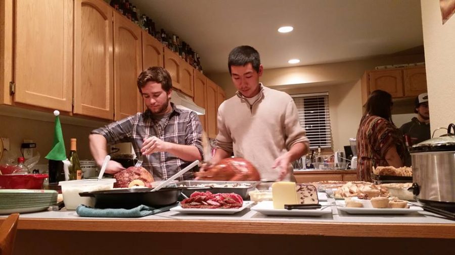 Skyler Leonard and Lawrence Lam from Collegian Cooks make a friendsgiving dinner. Photo credit: Katie Schmidt.