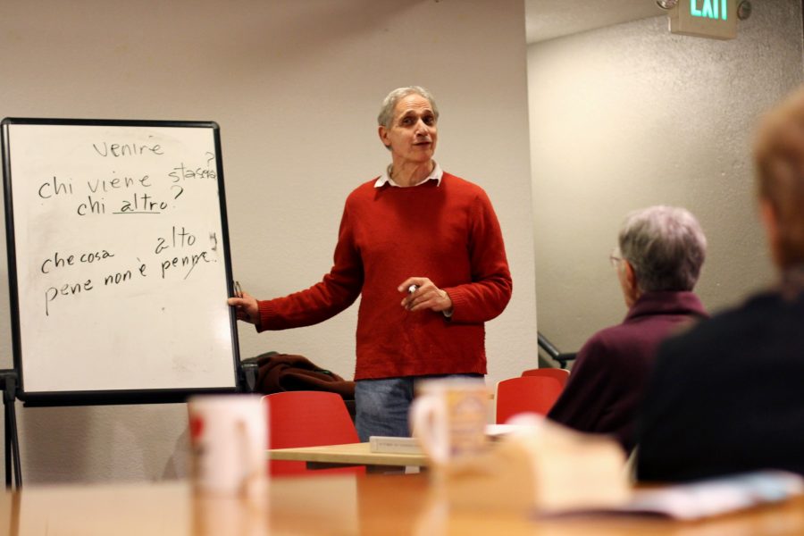 Italian language instructor, Andrew Cangelose expands his knowledge and expertise with his intermediate class in the basement of Mugs early Tuesday evening. (Photo by Topher Brancaccio)