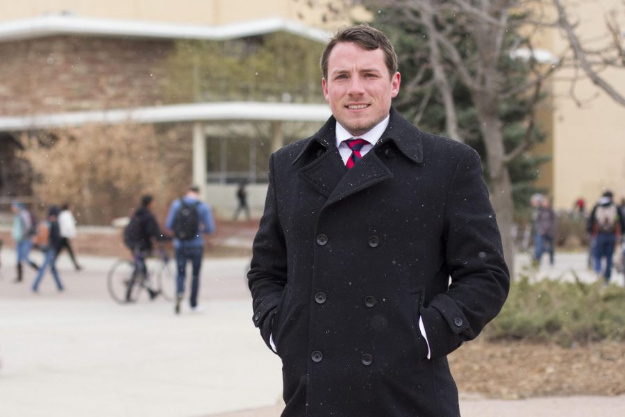 Senior Political Science major, Jason Sydoriak, selected as one of the 2015 Truman Finalists exhibits continued leadership qualities early Wednesday, even during chilly mornings on the plaza. (Photo credit: Topher Brancaccio.)