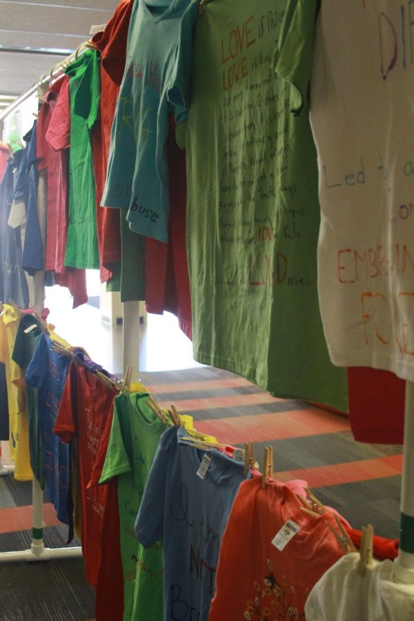 T-shirts made by survivors of sexual assault hang in Durrell Center on Tuesday as part of the Clothesline Project, which raises awareness of sexual assault.