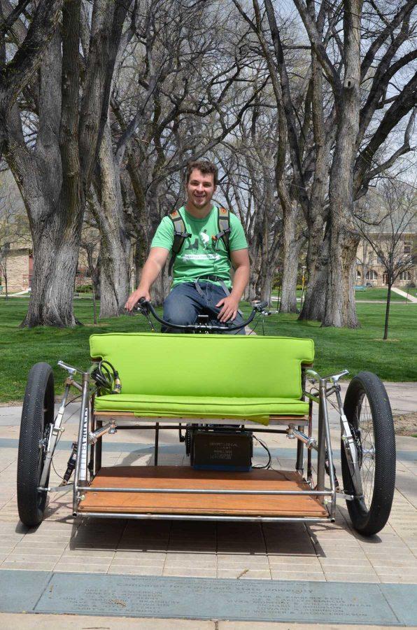 CSU graduate Kevin Kruglat takes a little break from giving students free rides around campus to take a few photos in the Oval on Thursday.  Kruglat and his business partner recently started the business called Tadpole Pedicabs. The name is insprired by the tadpole style pedicab that puts the rider in front of the driver. 
