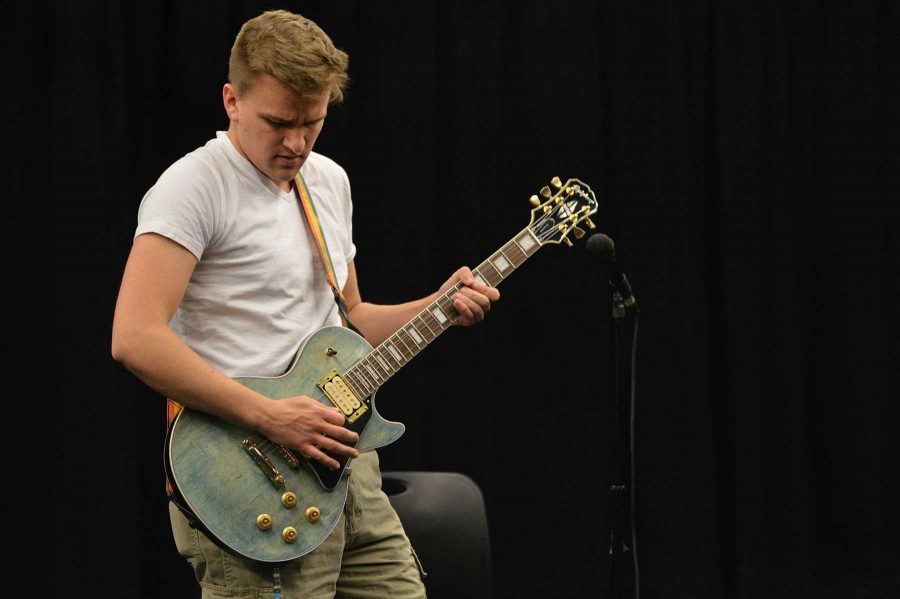 Sophomore business major, Michael Wells shreds on his Epiphone Les Paul guitar during his audition for CSUs Got Talent on Wednesday, March 11, 2015. (Photo credit: Cisco Mora)