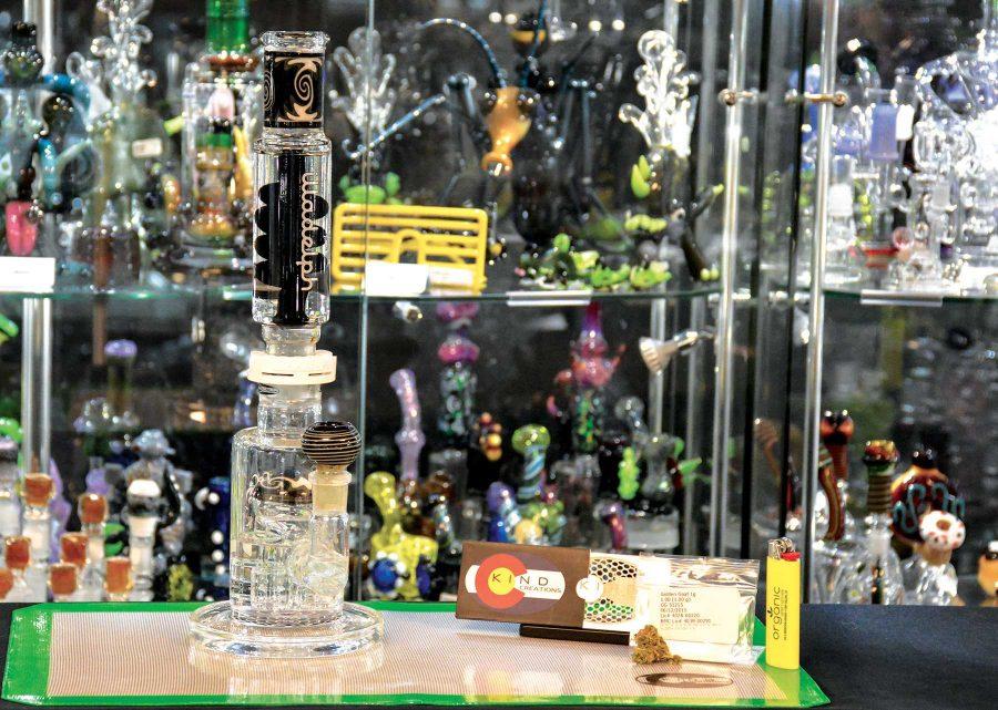 In a switch of scenery, this weeks Roastin with Rick takes place inside Kind Creations located at 828 S. College Ave. The strain reviewed, Golden Goat — a sativa-dominant hybrid strain first bred in Topeka, Kansas — was smoked out of Illadelph Glass and Kind Creations collaboration piece, the Killadelph quad-oil drum base with attached glycerine coil condenser top. (Photo credit: Andrew Balch)
