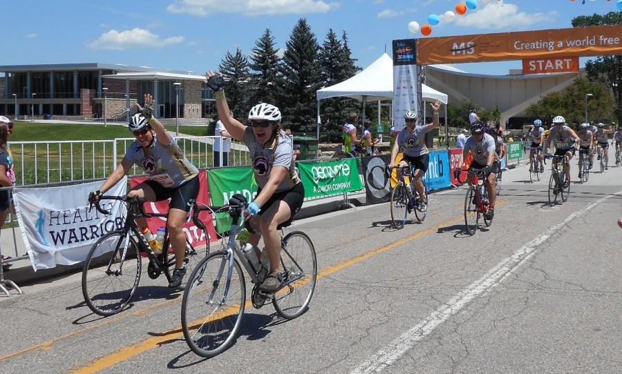 Bike MS participants crossing the finish line at CSU campus