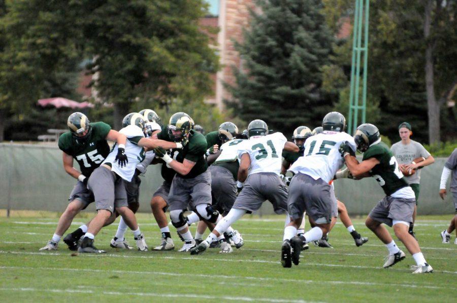 CSU head coach Mike Bobo is asking the offensive line to lead during fall camp. (Photo by: Emmett McCarthy)