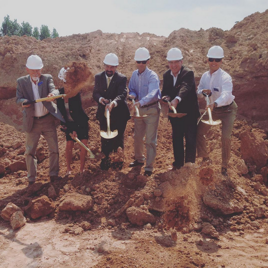 CSU President Tony Frank, Mayor Wade Troxell and other members of the community break ground on the new Semester at Sea building south of the CSU campus. (Photo Credit: Colorado State University Instagram).