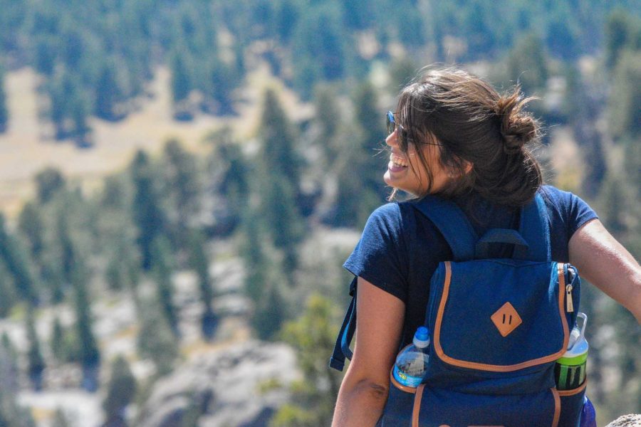 Isabelle Araújo, 21, an international student from Brazil, enjoys the incredible view form a hike at the Rocky Mountain National Park. 