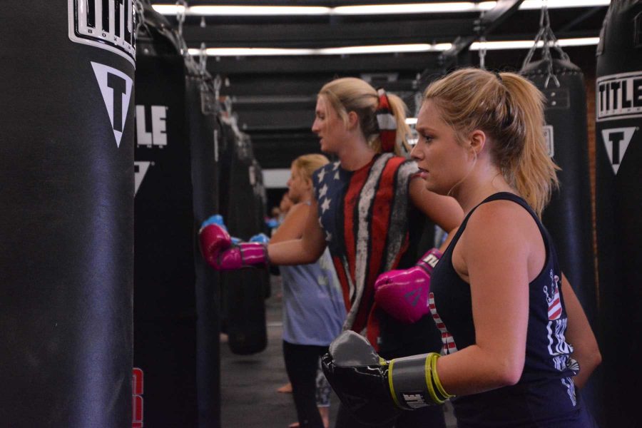 Members of Zeta Tau Alpha, a sorority on campus participated in a boxing event Sunday at Title Boxing Club in Fort Collins. They completed warm-ups and punched bags for the majority of the class. (Photo Credit: Megan Fischer)