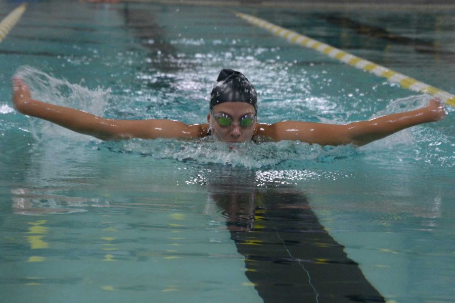 Members of the synchronized swimming team practice at the Dick-Hewson Acquatic Center in Loveland Monday after having their on-campus practices cancelled. (Photo Credit: Megan Fischer)