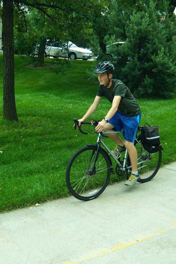 Alex Claiborn, 14, on a relaxed bike ride over Spring Park in the city of Fort Collins.