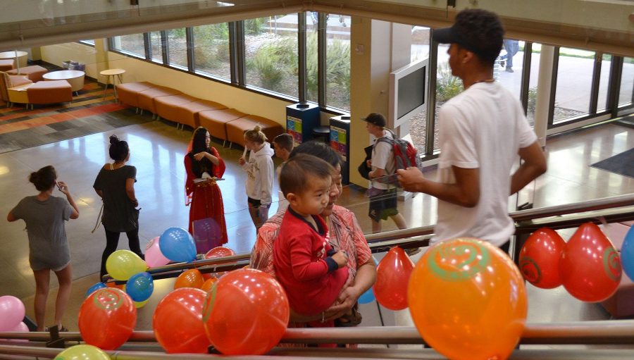 Colorful balloons line the rales that lead the Chinese Mid-Autumn Festival goers to the Durrell dining center.