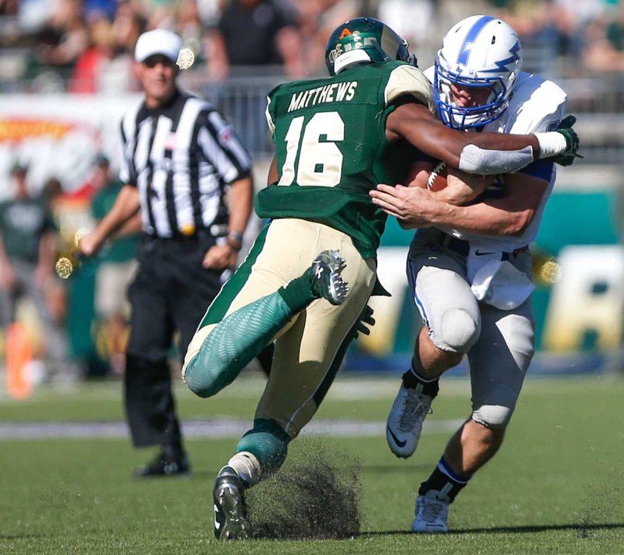 Colorado State safety Trent Matthews tackles an Air Force ballcarrier during the Rams' win over the Falcons earlier this seaso. (Abbie Parr/Collegian)