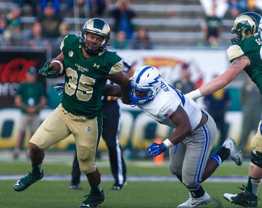 Colorado State running back Izzy Matthews (35), breaks away from an Air Force defender during a game earlier this season. (Abbie Parr/Collegian)