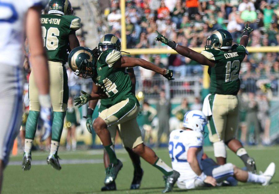 Colorado State defensive players celebrate a takeaway during the Rams win over Air Force earlier this season. (Abbie Parr/Collegian)