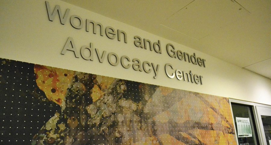 WGAC's lettering is accompanied with art that welcomes student outside of their office in the LSC next to the LGBT office.