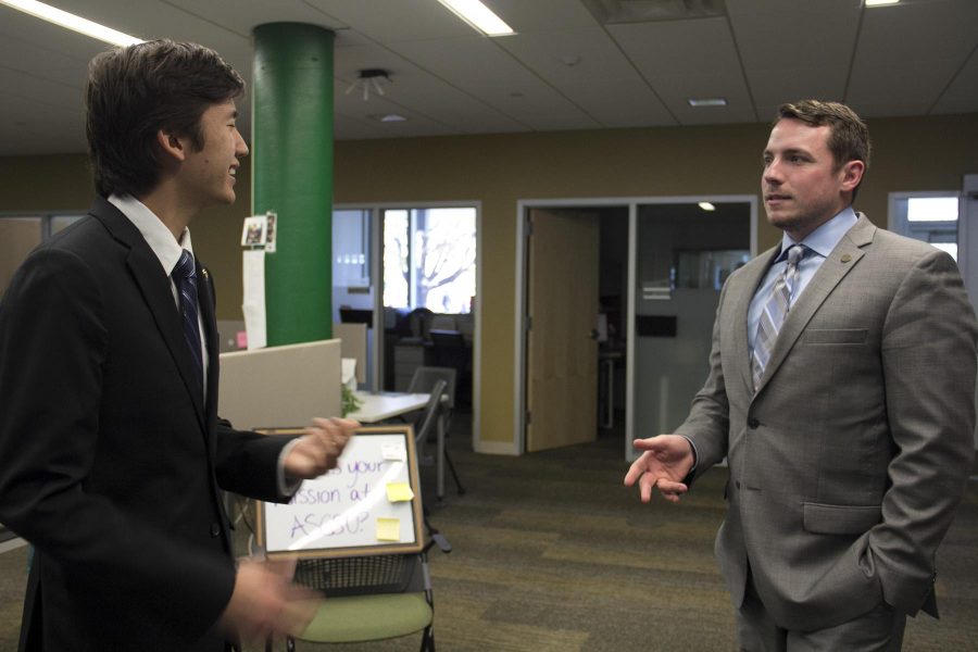 ASCSU President, Jason Sydoriak, and Director of Community Affairs, Edward Kendall, discussing upcoming community involvement and legislation supporting reform and improvements to better the experience of CSU students prior to senate session Wednesday evening.