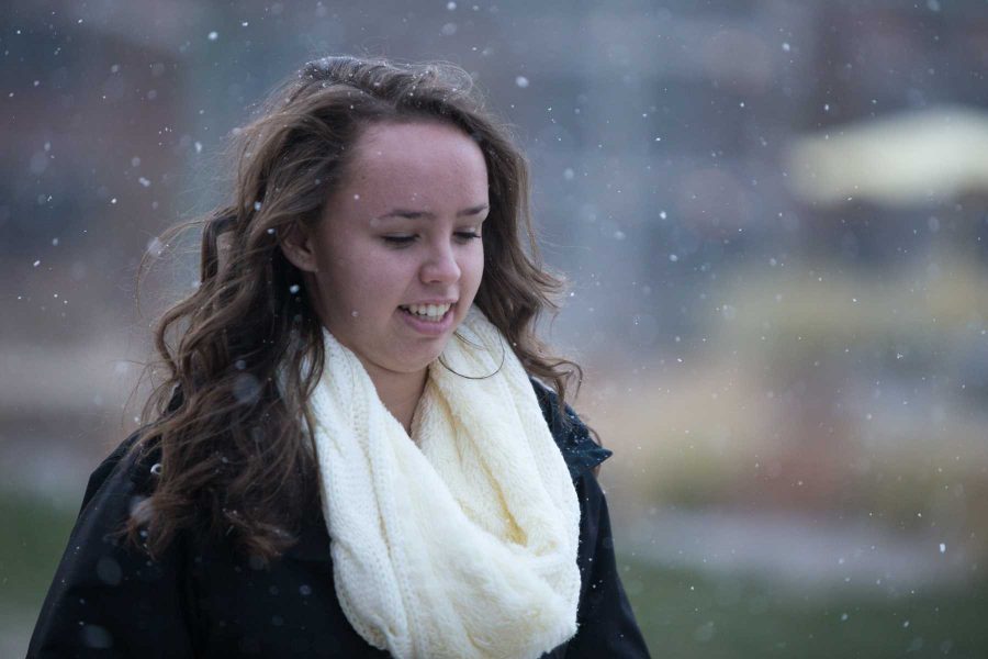 Freshman Katy Hobbes walks to her dorm in the snow Wednesday. Photo by Ryan Arb
