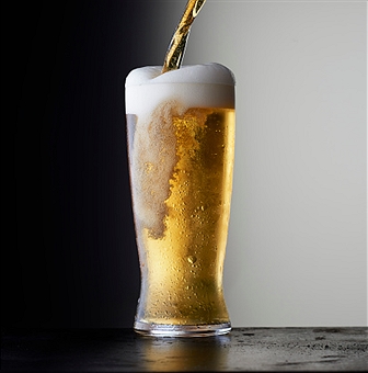 Simple stock beer on a dark background.