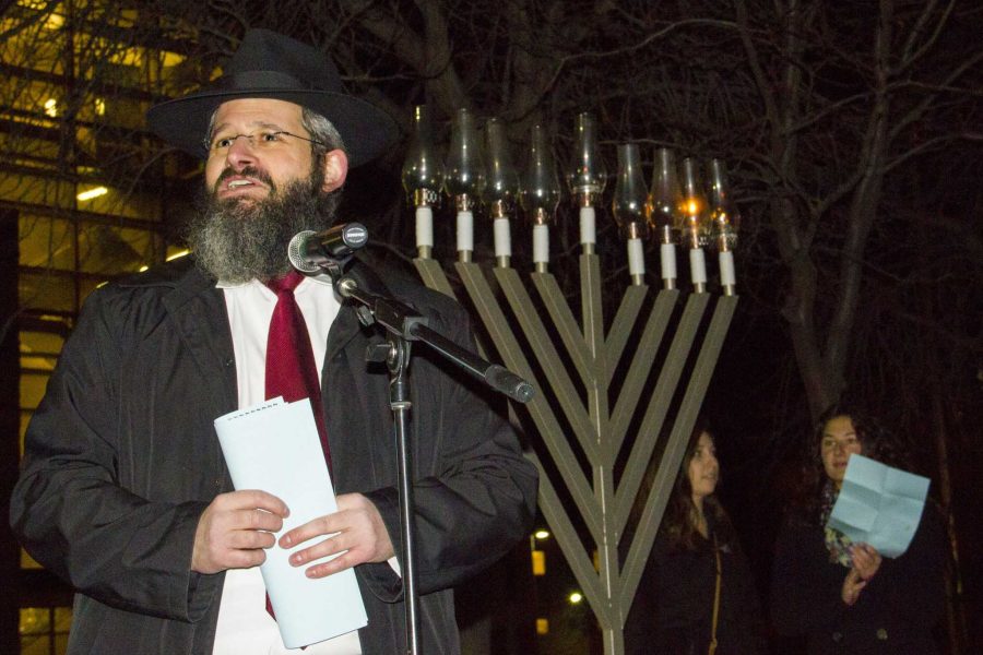 Rabbi Yerachmiel Gorelik led the menorah lighting ceremony spoke of the spiritual significance behind Hanukkah and the light of the menorah.