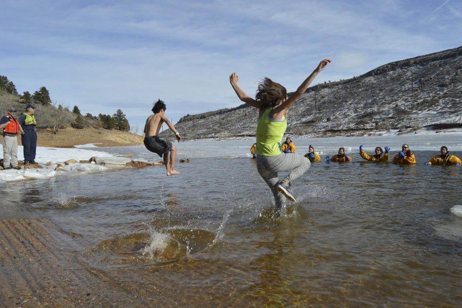 People plunge into near-freezing Horsetooth Reservoir for charity