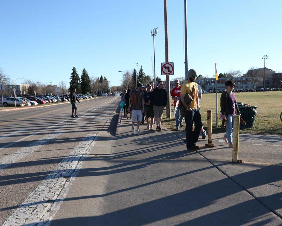 Many flocked to CSUs campus Sunday for Sen. Bernie Sanders rally at Moby Arena. The line extended far beyond the Arena and wraped around one of the large fields outside the student recreation center. (Photo By: Megan Fischer)