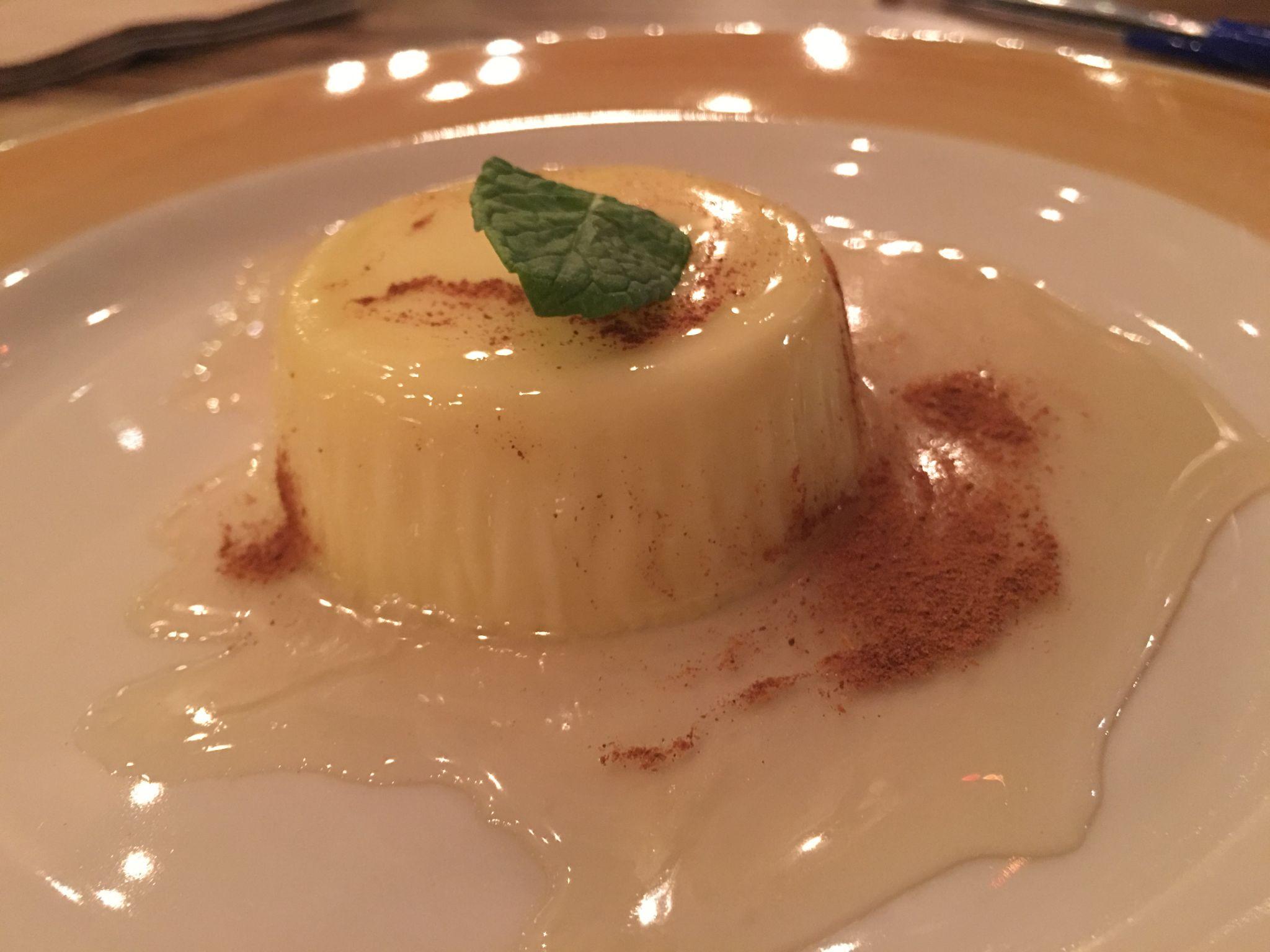 Flan drenched with Mezcal tequila-infused honey and adorned with cinnamon and mint. Photo by Rachael Worthington. 