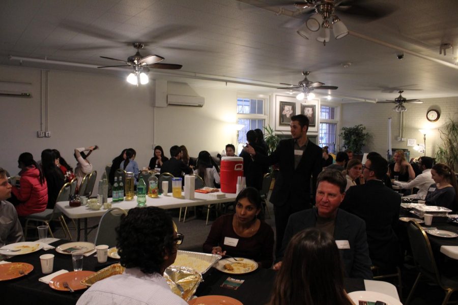 Students and faculty taking part in the fourth annual Cultural Food Festival hosted by the Global Business Network