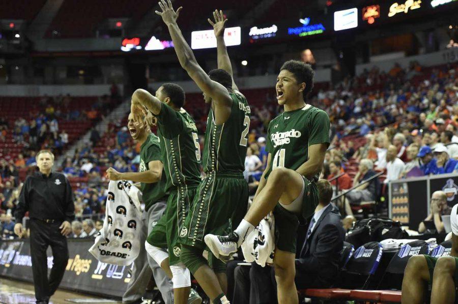 Colorado State players celebrate on the bench during the Mountain West conference tournament. (Justin Tafoya/NCAA Photos)
