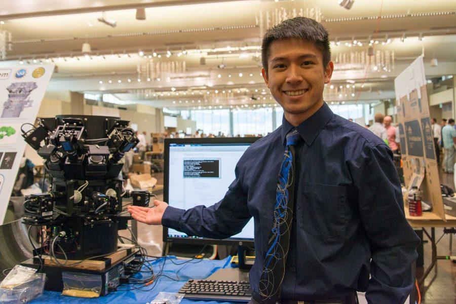 Michael Thanh displays the senior design project he worked on: Snowflake Sensing System at E-Days 2016 in the Lory Student Center (Luke Walker/ The Collegian)