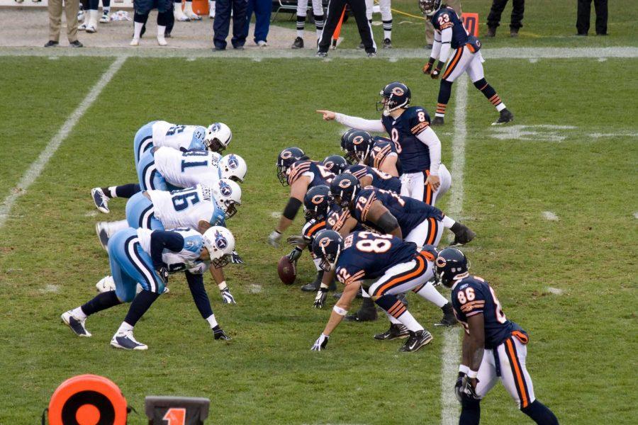Rex Grossman points out the defense scheme before the snap (Photo Credit: Wikipedia).