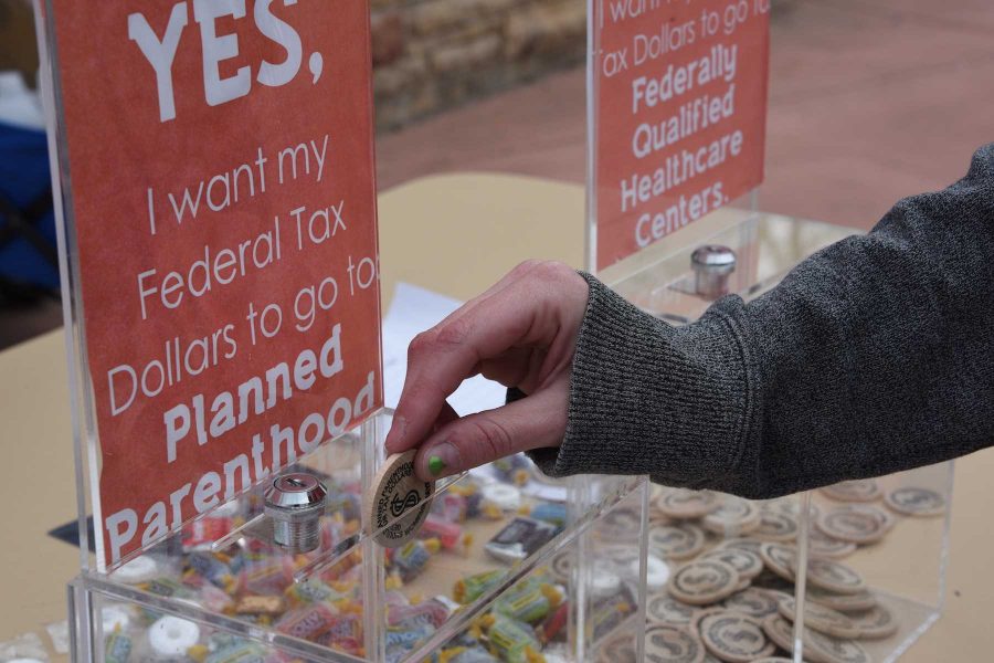 Students were presented with tokens in which they could vote whether they want Federal Tax Dollars to fund Planned Parenthood or Federally Qualified Healthcare Centers.