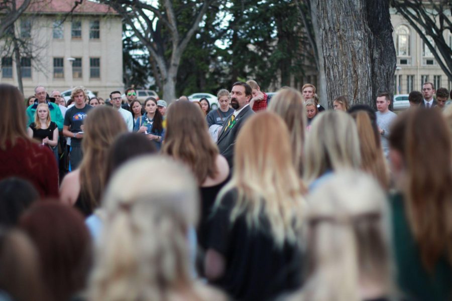 CSU President, Tony Frank, addresses the community in the center of the Oval. 