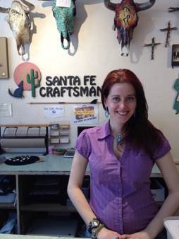 Natalieann Mahs models jewelry from Santa Fe Craftsman while she works. (Photo by Zoe Jenning) 