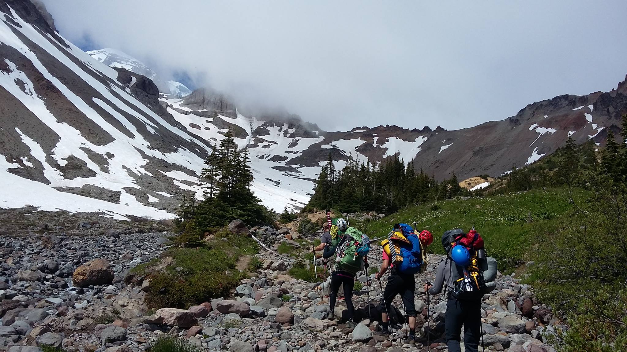 VetEx Climbers on the lower portions of Mount Rainier. From left to right: Nick Watson, Sandra sandrute, Nathan perrault, Nathan vass. (Photo By: Nick Watson)