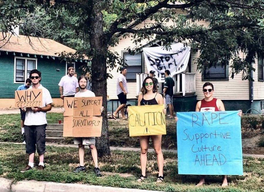 Women and Gender Advocacy Center protests signs on CSU move-in day