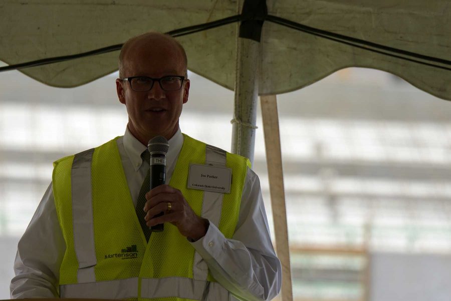 Joe Parker address a group of alumni, donors, and workers at a celbration of the halway point of construction of the new on campus stadium on August 2nd, 2016 (Luke Walker/ Collegian).