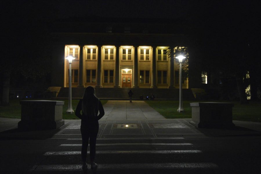 A CSU student walks the campus Thursday night. According to several sources, a woman’s first few weeks of college is a “red zone” for sexual violence. (Michael Berg | Collegian) Photo credit: Michael Berg