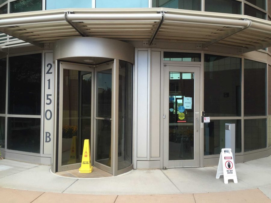 The doors to one of the Unites States Department of Agriculture buildings in Fort Collins is blocked by warning signs and posted letters notifying the public of the closure on Tuesday, August 30th. All of the USDA offices in Fort Collins were closed due a security threat. Photo credit: Forrest Czarnecki